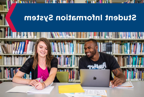 Student Information System banner on top of photo of two students studying in library.